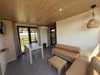 Camping Crin Blanc_Arles - locatif salon &copy; 
